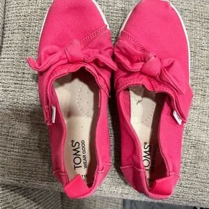 TOMS Pink Canvas Slip-On Shoes with bow